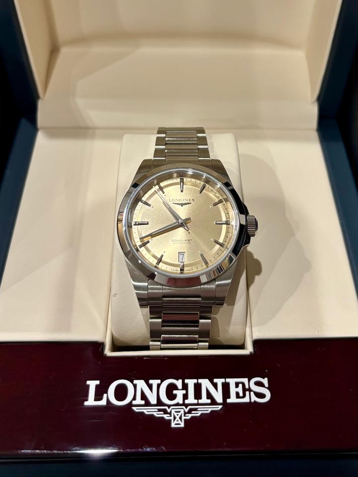 Longines Conquest 38mm Champagne Dial. Box and Papers